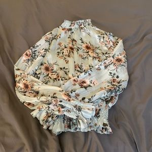 Sheer floral bluish sea foam colored high neck blouse size small.